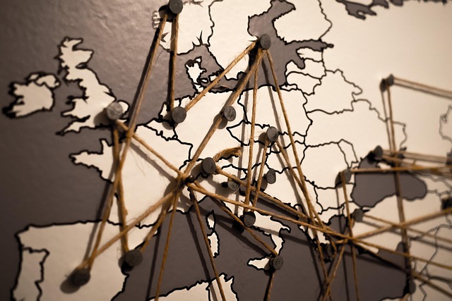 a tangle of yarn lines over a map